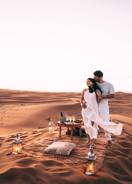 Couple image in the moroccan desert.